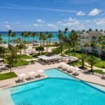 Vista aérea de The Westin Puntacana Resort con alberca, palmeras y playa